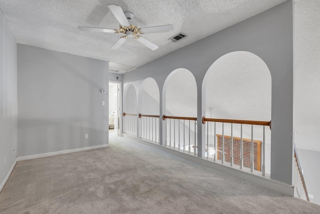 1520 Breamstone Rdg, Tallahassee, FL 32312 - spare room featuring ceiling fan, a textured ceiling, carpet, and baseboards