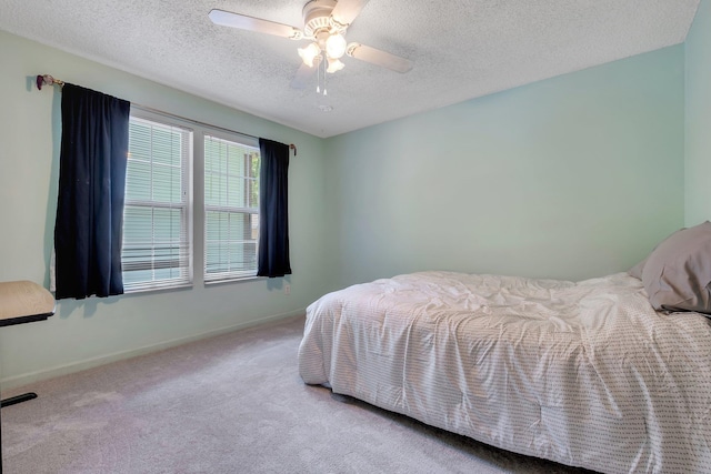 1520 Breamstone Rdg, Tallahassee, FL 32312 - carpeted bedroom with a textured ceiling, baseboards, and ceiling fan