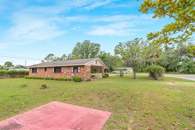 105 Goff St, Perry, FL 32347 - view of front of property featuring a patio and brick siding