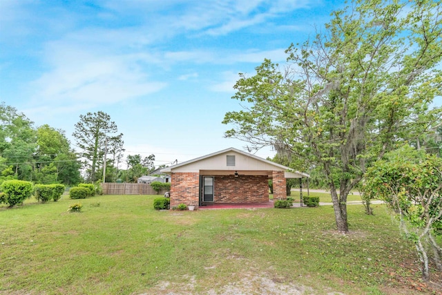 105 Goff St, Perry, FL 32347 - view of yard with a ceiling fan