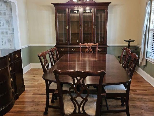 dining room with wood-type flooring