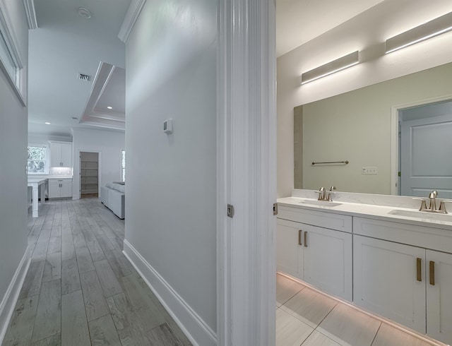 3353 Jasmine Hill Rd, Tallahassee, FL 32311 - hall featuring a sink and light wood-style flooring