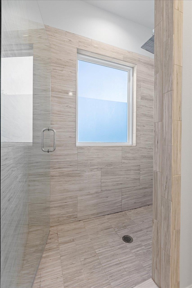 bathroom with an enclosed shower