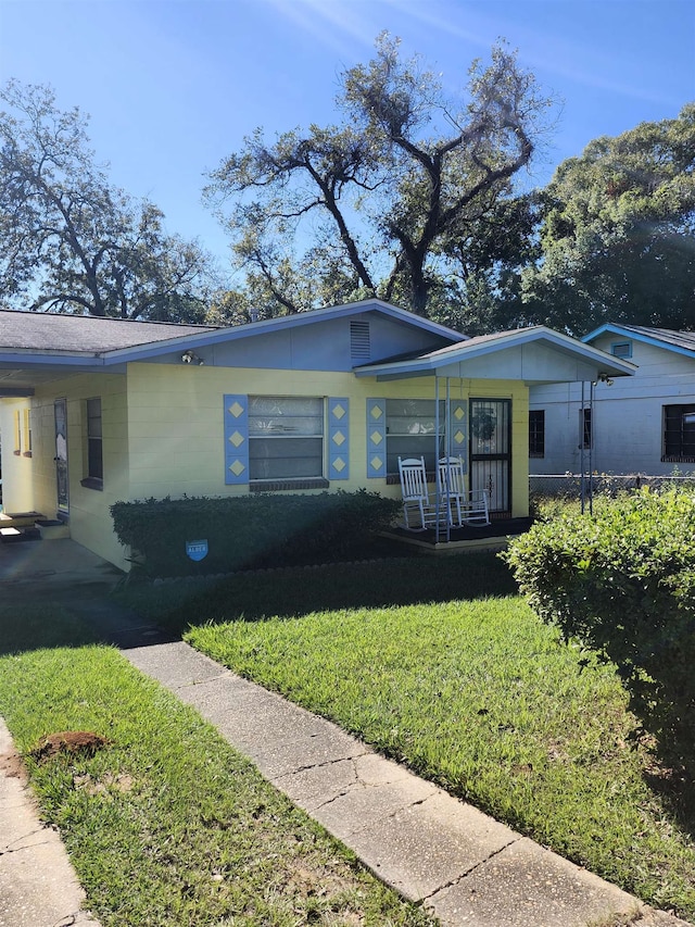 view of front of home with a front yard