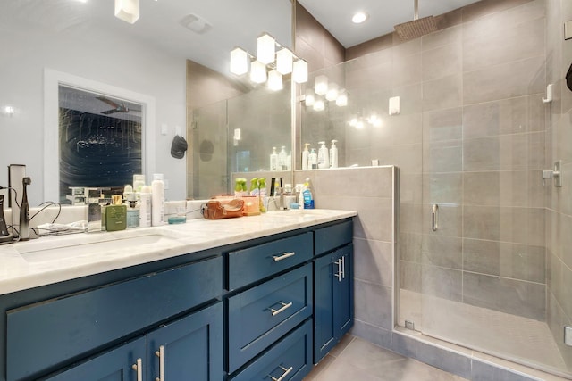 1256 N Bronough St, Tallahassee, FL 32303 - full bathroom with a stall shower, double vanity, and tile patterned floors