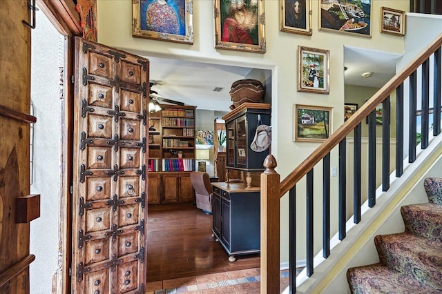 3508 Trillium Ct, Tallahassee, FL 32312 - stairway featuring wood finished floors
