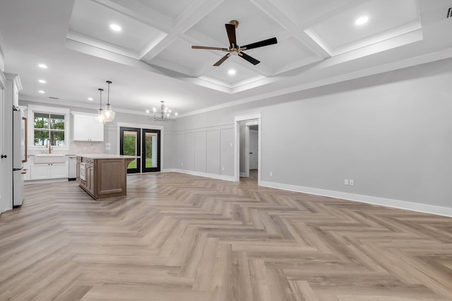 205 Fairway Dr, Havana, FL 32333 - unfurnished living room featuring a chandelier, a sink, coffered ceiling, ceiling fan, and baseboards