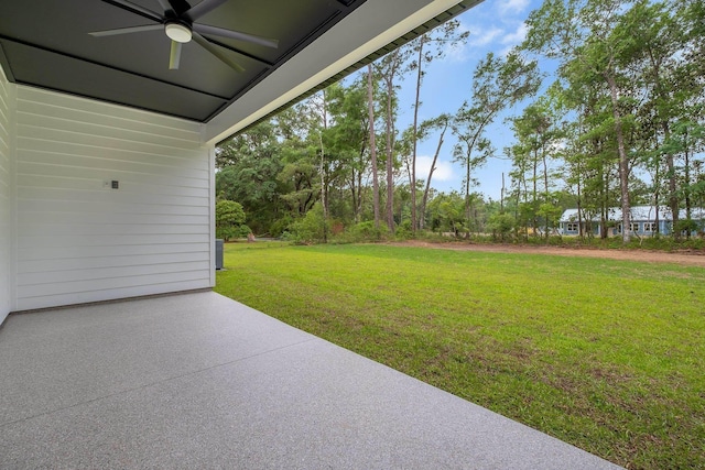 205 Fairway Dr, Havana, FL 32333 - view of green lawn featuring a ceiling fan and a patio