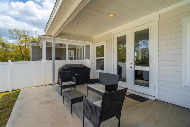 5735 Pinebarren Rd, Tallahassee, FL 32303 - view of patio featuring fence and a grill