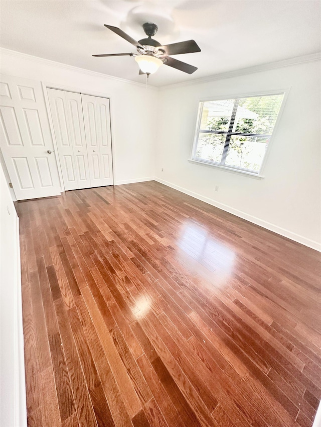 24118 Lone Star Rd, Tallahassee, FL 32310 - unfurnished bedroom with wood finished floors, a closet, and crown molding