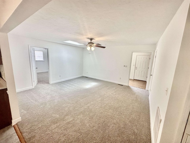 24118 Lone Star Rd, Tallahassee, FL 32310 - carpeted spare room with baseboards, a ceiling fan, and a textured ceiling