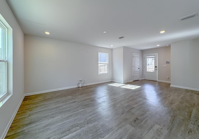 empty room featuring hardwood / wood-style flooring