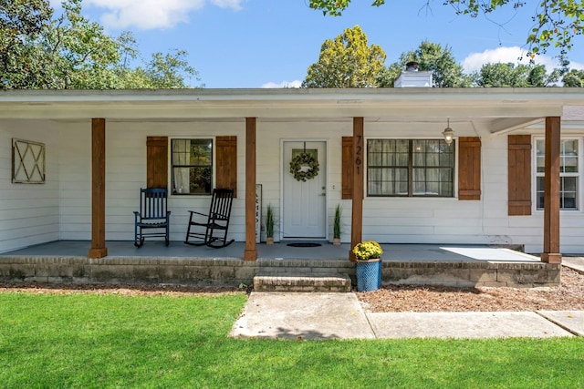 property entrance with a porch