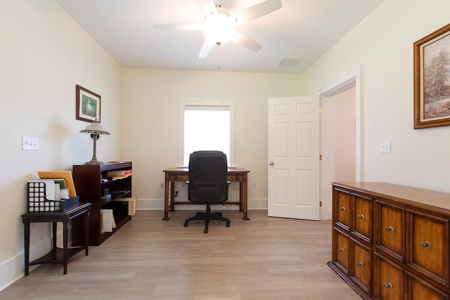 office area with ceiling fan and light wood-type flooring