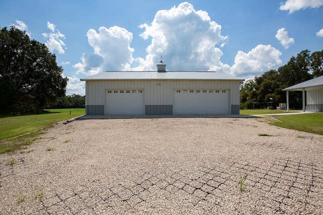 garage with a yard