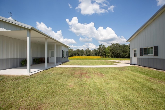 view of yard featuring a carport