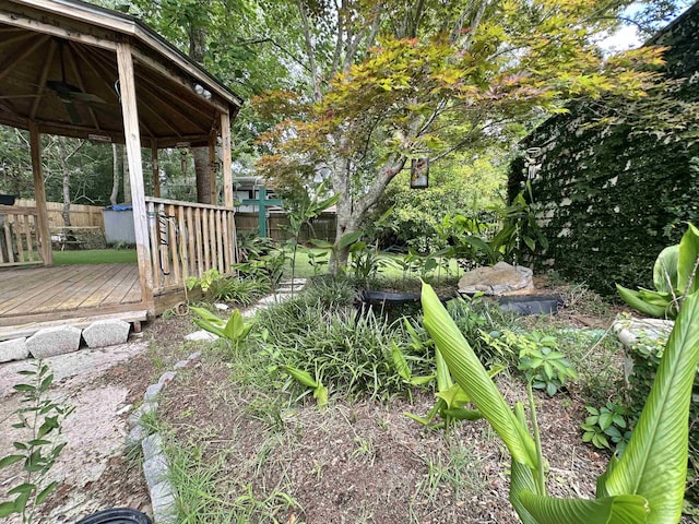 508 NE 3rd St, Havana, FL 32333 - fenced backyard with a gazebo and a wooden deck