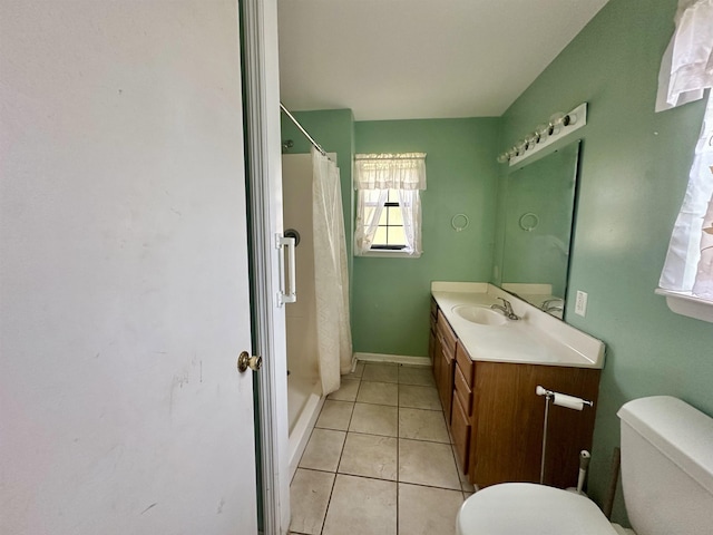 508 NE 3rd St, Havana, FL 32333 - full bathroom featuring toilet, plenty of natural light, vanity, and tile patterned flooring