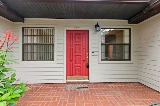 entrance to property with a porch