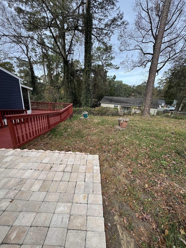 view of yard featuring a deck