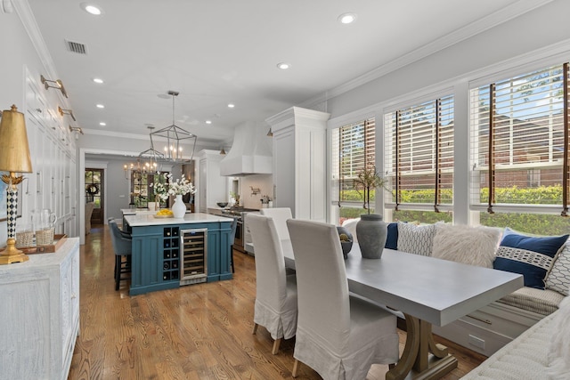 1216 Mitchell Ave, Tallahassee, FL 32303 - dining room with recessed lighting, visible vents, crown molding, and wine cooler