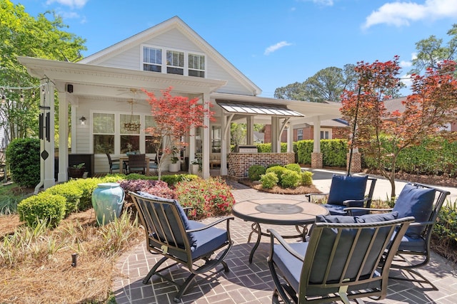 1216 Mitchell Ave, Tallahassee, FL 32303 - rear view of property featuring a patio