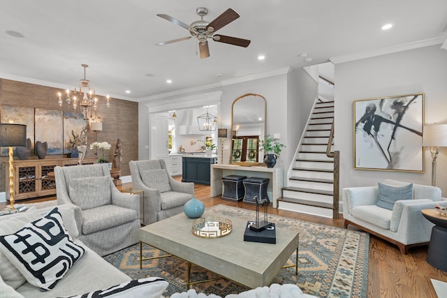 1216 Mitchell Ave, Tallahassee, FL 32303 - living room with stairway, recessed lighting, light wood finished floors, and ceiling fan with notable chandelier