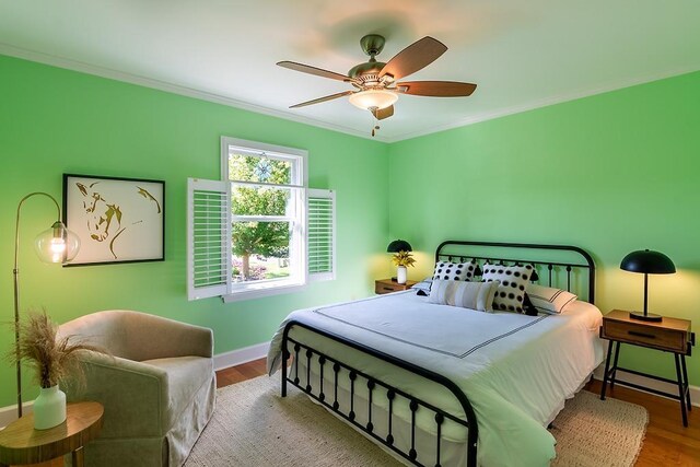 696 Lupine Ln, Tallahassee, FL 32308 - bedroom featuring crown molding, wood finished floors, and ceiling fan