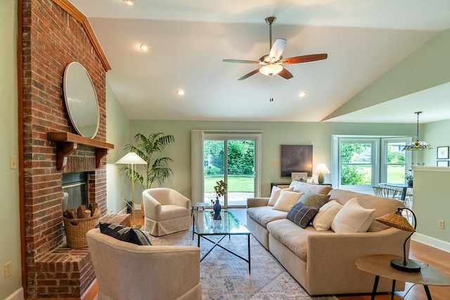 696 Lupine Ln, Tallahassee, FL 32308 - living room with vaulted ceiling, healthy amount of natural light, ceiling fan, a fireplace, and recessed lighting