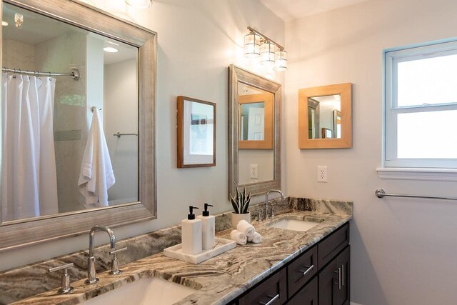 696 Lupine Ln, Tallahassee, FL 32308 - full bath with double vanity and curtained shower