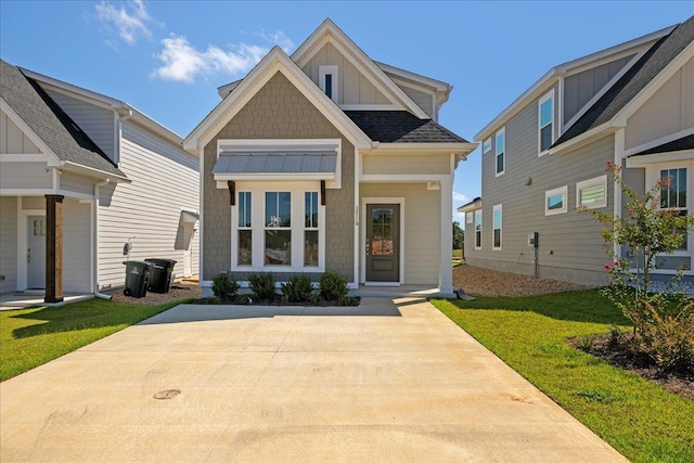 view of front of house with a front lawn