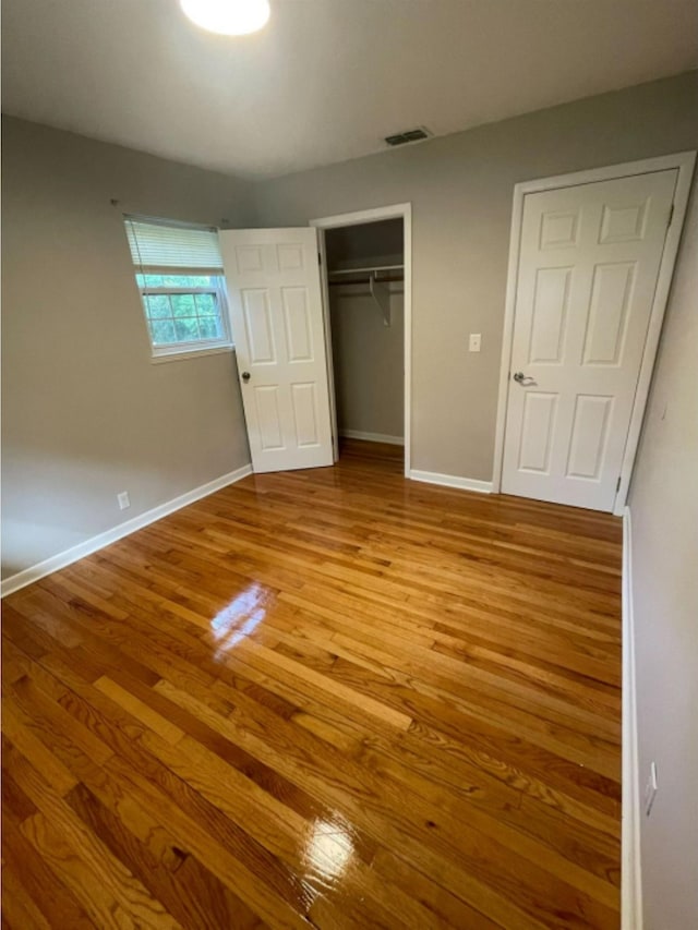 unfurnished bedroom with light hardwood / wood-style flooring