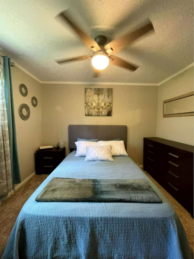 bedroom with a textured ceiling, carpet, ornamental molding, and ceiling fan
