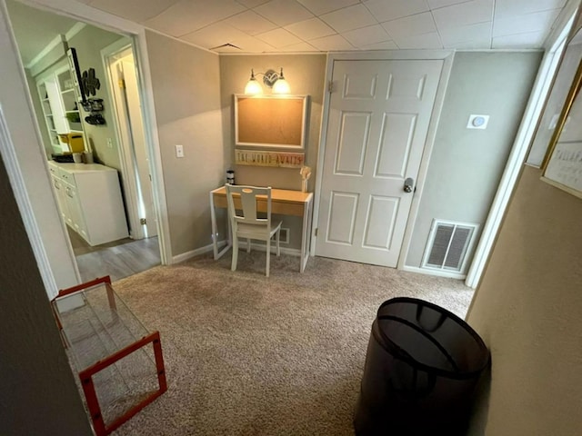 home office featuring light colored carpet