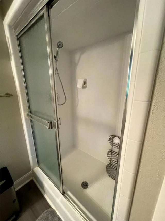 bathroom with an enclosed shower
