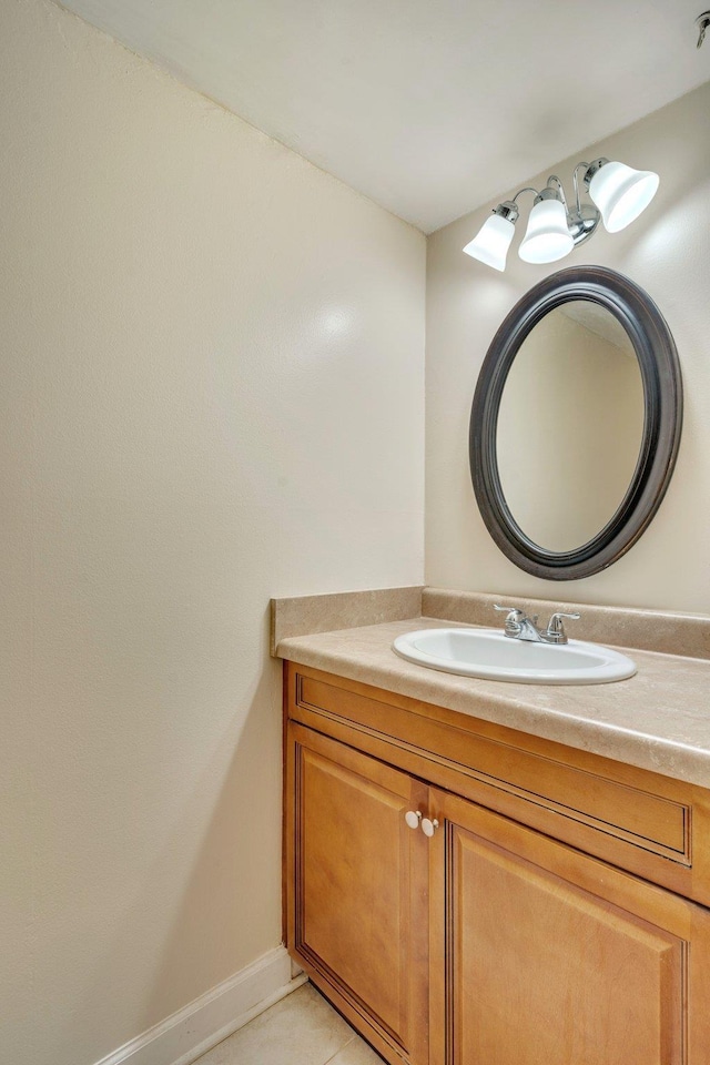 bathroom with vanity and tile patterned flooring