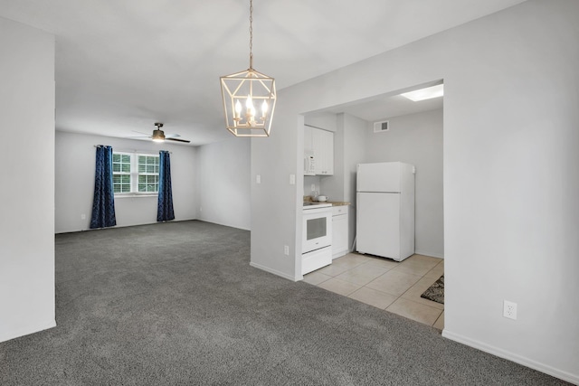 interior space featuring ceiling fan with notable chandelier and light carpet