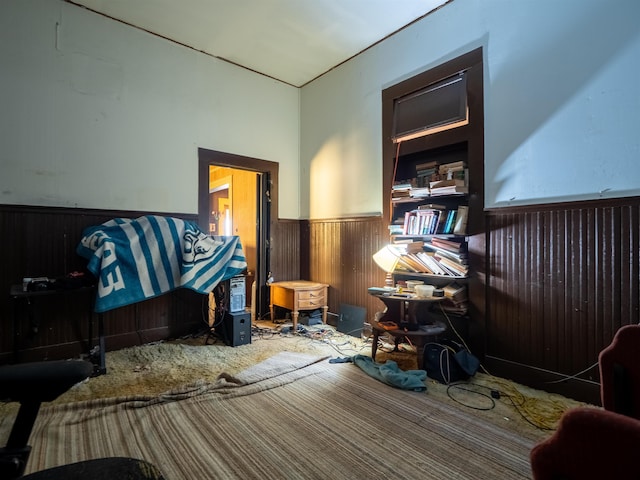 interior space featuring wooden walls