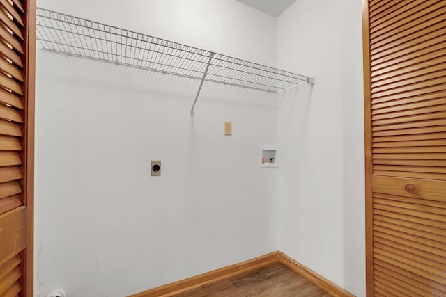 laundry room featuring hardwood / wood-style flooring, hookup for an electric dryer, and hookup for a washing machine