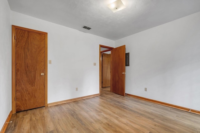 unfurnished room featuring light wood-type flooring