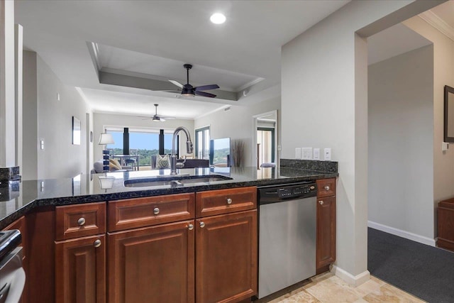 121 N Monroe St, Tallahassee, FL 32301 - kitchen featuring appliances with stainless steel finishes, ceiling fan, dark stone counters, and a peninsula