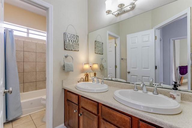 10446 Rose Rd, Tallahassee, FL 32311 - full bathroom featuring double vanity, a sink, tile patterned floors, and toilet