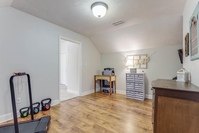 10446 Rose Rd, Tallahassee, FL 32311 - office area featuring light wood-style flooring, baseboards, vaulted ceiling, and visible vents