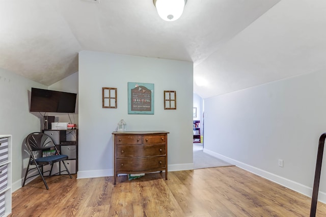 10446 Rose Rd, Tallahassee, FL 32311 - interior space with baseboards, lofted ceiling, and wood finished floors