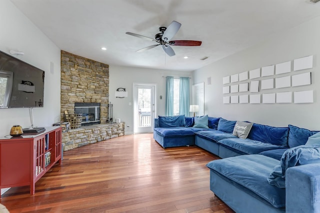 10446 Rose Rd, Tallahassee, FL 32311 - living area featuring recessed lighting, hardwood / wood-style floors, visible vents, a ceiling fan, and a stone fireplace