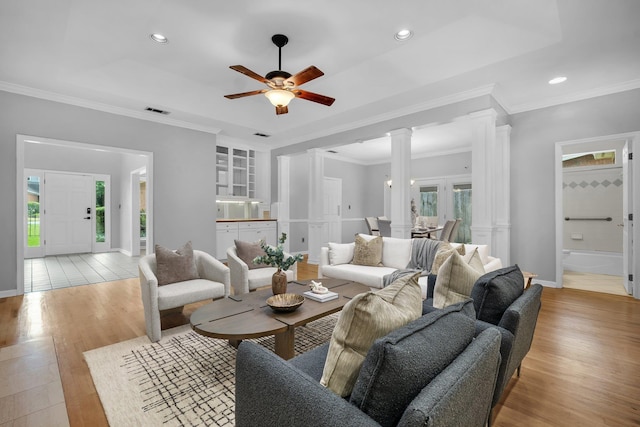 4012 Dutchess Ct, Tallahassee, FL 32309 - living area with ceiling fan, light wood finished floors, ornate columns, recessed lighting, and ornamental molding