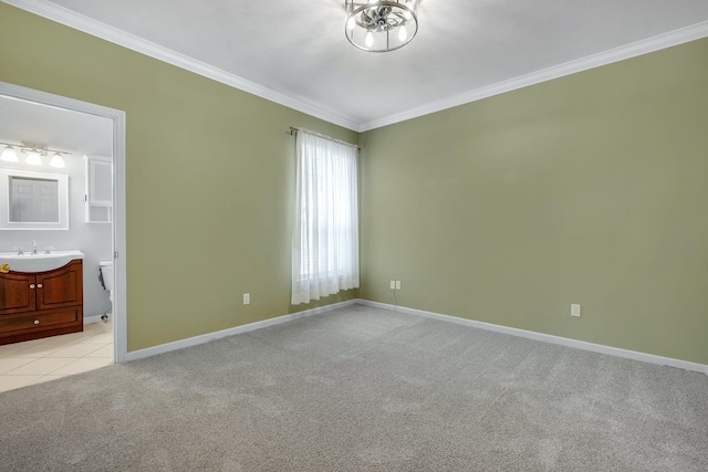 4012 Dutchess Ct, Tallahassee, FL 32309 - unfurnished bedroom featuring crown molding, light colored carpet, ensuite bathroom, and light tile patterned floors