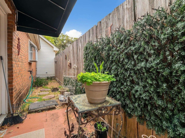 4012 Dutchess Ct, Tallahassee, FL 32309 - fenced backyard featuring a patio area