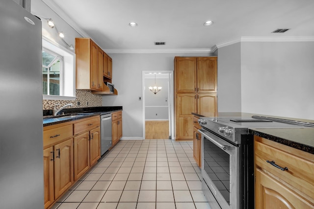 4012 Dutchess Ct, Tallahassee, FL 32309 - kitchen featuring appliances with stainless steel finishes, ornamental molding, backsplash, a chandelier, and recessed lighting