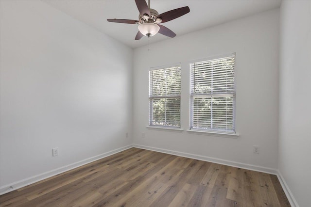 4312 Four Oaks Blvd, Tallahassee, FL 32311 - spare room with wood finished floors and ceiling fan